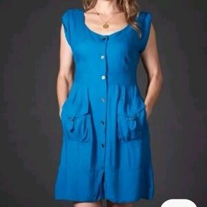 Anthro’s Maeve Staysail Safari shirt dress in teal blue